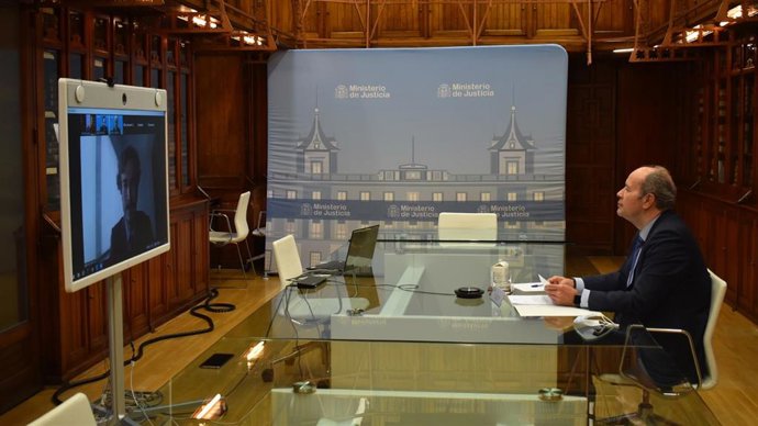 El ministro de Justicia, Juan Carlos Campo, interviene de forma telemática en la inauguración del VI Encuentro CUMPLEN