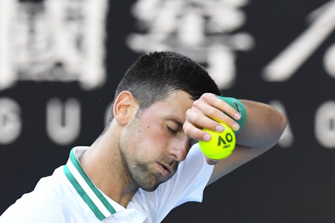 Novak Djokovic of Serbia reacts during his second Round Men's singles match against Frances Tiafoe of the United States of America on Day 3 of the Australian Open at Melbourne Park in Melbourne, Wednesday, February 10, 2021. (AAP Image/Dave Hunt) NO ARC