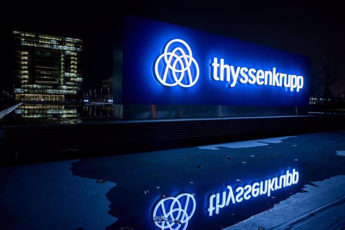 FILED - 20 November 2019, North Rhine-Westphalia, Essen: The ThyssenKrupp logo is reflected on a water surface. German steel and engineering conglomerate Thyssenkrupp has finally completed the sale of its profitable elevator division to a consortium of 