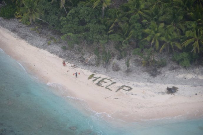Ayuda escrito en una isla del Pacífico.