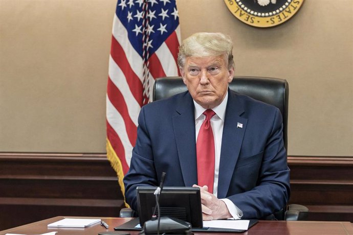 FILED - 26 March 2020, US, Washington: US President Donald Trump holds a governors' video teleconference in the White House Situation Room. USPresident Donald Trump confirmed the country's top infectious disease expert, Anthony Fauci, will testify befo