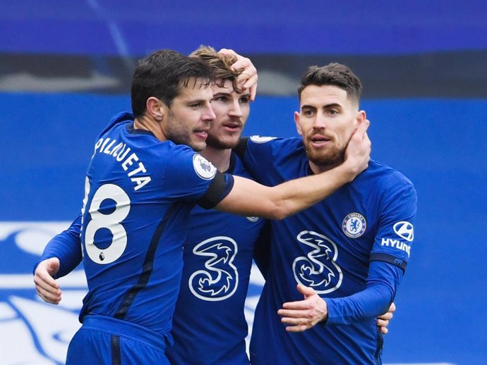 Chelsea's Cesar Azpilicueta, Timo Werner and Jorginho celebrate their side's second goal scored by Marcos Alonso during the English championship Premier League football match between Chelsea and Burnley on January 31, 2021 at Stamford Bridge in London, 