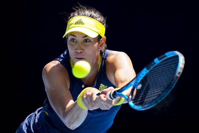 Garbine Muguruza of Spain in action during her third Round Women's singles match against Zarina Diyas of Kazakhstan on Day 5 of the Australian Open at Melbourne Park in Melbourne, Friday, February 12, 2021. (AAP Image/Dave Hunt) NO ARCHIVING, EDITORIAL 
