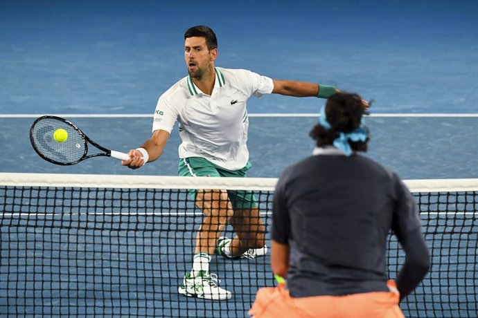 Novak Djokovic of Serbia in action during his fourth Round Men's singles match against Milos Raonic of Canada on Day 7 of the Australian Open at Melbourne Park in Melbourne, Sunday, February 14, 2021. (AAP Image/Dave Hunt) NO ARCHIVING, EDITORIAL USE ON
