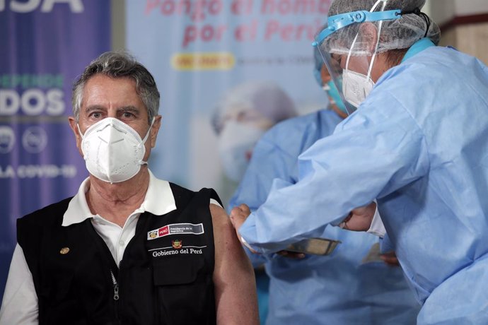 HANDOUT - 09 February 2021, Peru, Lima: Francisco Sagasti, President of Peru, receives a dose of China's Sinopharm COVID-19 vaccine. Photo: Albeto Orbegoso/Peruvian Presidency/dpa - ATTENTION: editorial use only and only if the credit mentioned above is