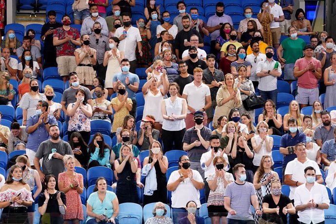 Spectators are seen in the crowd during the second Round Men's singles match between Alex de Minaur of Australia and Pablo Cuevas of Uruguay on Day 4 of the Australian Open at Melbourne Park in Melbourne, Thursday, February 11, 2021. (AAP Image/Dave Hun