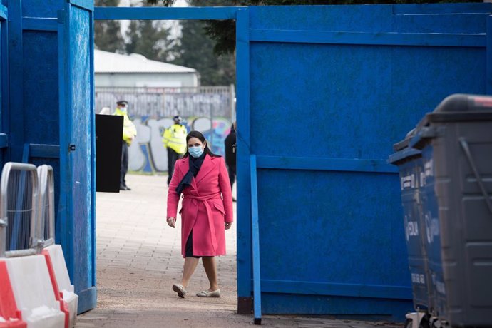 10 February 2021, United Kingdom, London: UK Home Secretary Priti Patel arrives to meet with NHS staff and volunteers during a visit to the Byron Hall Vaccination Centre in Harrow. Photo: Stefan Rousseau/PA Wire/dpa