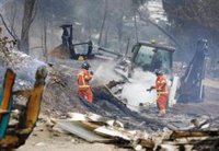 Extinguido el incendio del asentamiento chabolista de Palos (Huelva), que afecta al 40% del campamento