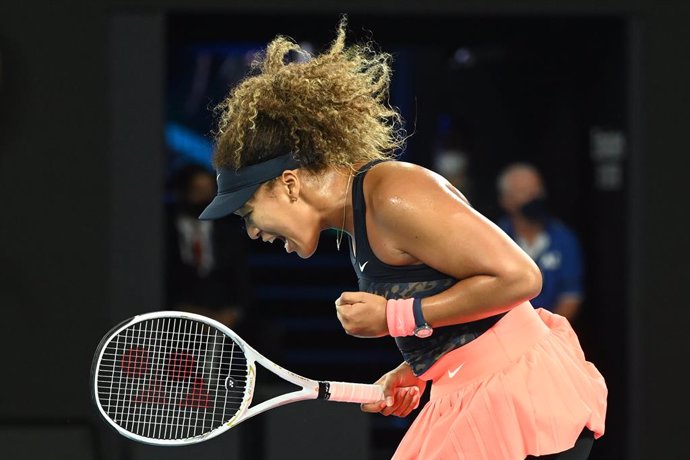 Naomi Osaka of Japan celebrates winning a point in the second set before the women's singles final against Jennifer Brady on day 13 of the Australian Open tennis tournament at Rod Laver Arena in Melbourne,, Saturday, February 20, 2021. (AAP Image/Dave H