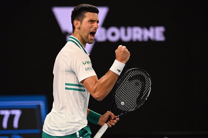 Novak Djokovic of Serbia reacts after defeating Aslan Karatsev of Russia in the Men's singles semifinals match on Day 11 of the Australian Open at Melbourne Park in Melbourne, Thursday, February 18, 2021.(AAP Image/Dean Lewins) NO ARCHIVING, EDITORIAL U