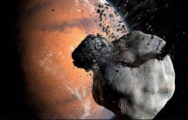 Impresión artística de la colisión entre una luna primordial marciana y un asteroide, que podría haber llevado a la formación de Fobos y Deimos.