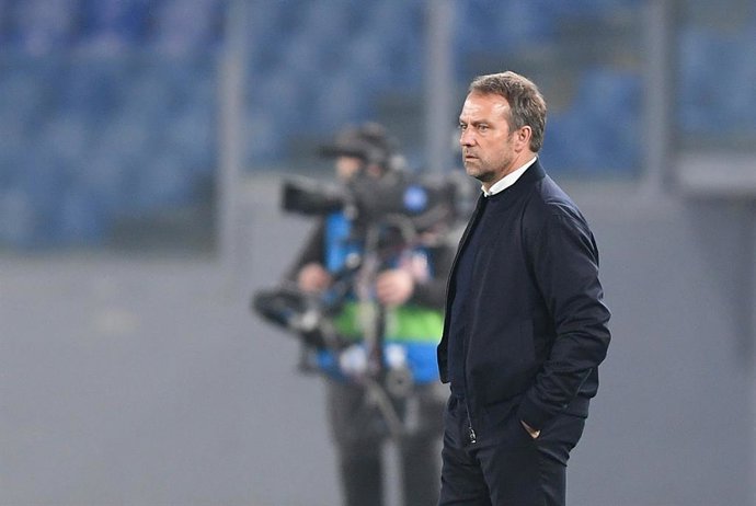23 February 2021, Italy, Rome: Munich Coach Hansi Flick stands on the sidelines during the UEFAChampions League round of 16 first leg soccer match between SS Lazio and FC Bayern Munich at the Olympic Stadium. Photo: Giuseppe Maffia/dpa