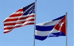 Archivo - Bnaderas de EEUU y Cuba