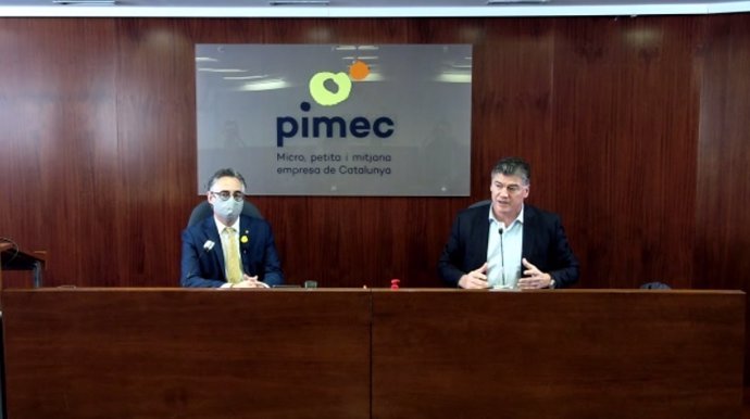 Archivo - El conseller de Empresa y Conocimiento de la Generalitat, Ramon Tremosa, y el secretario general de Pimec, Antoni Cañete, en la sede de la patronal catalana