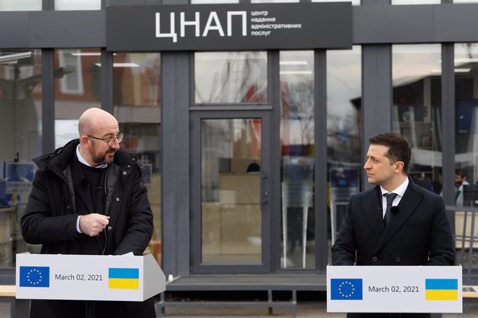 HANDOUT - 02 March 2021, Ukraine, Donbass: President of Ukraine Volodymyr Zelensky (R) and the President of the European Council Charles Michel speak at a press conference during a visit to the Donbass region in Ukraine. Photo: Dario Pignatelli/European