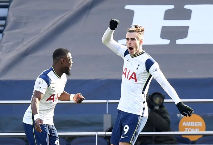 28 February 2021, United Kingdom, London: Tottenham Hotspur's Gareth Bale (R) celebrates scoring his side's fourth goal during the English Premier League soccer match between Tottenham Hotspur and Burnley at the Tottenham Hotspur Stadium. Photo: Daniel 