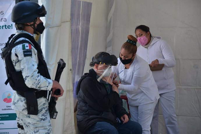 15 February 2021, Mexico, Mexico City: A man receives a dose of AstraZeneca coronavirus (Covid-19) vaccine at the vaccination site in Magdalena Contreras district during the vaccination campaign for adults over 60 years. Photo: Carlos Tischler/eyepix vi