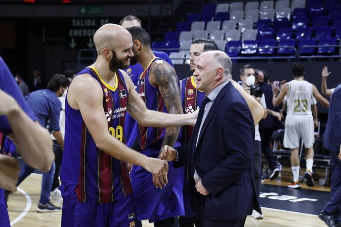 Archivo - Calathes (Bara) y Laso (Real Madrid)