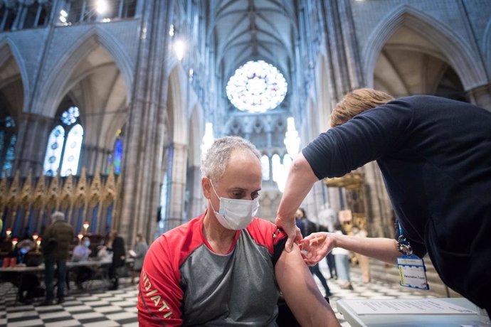 10 March 2021, United Kingdom, London: A man receives an injection of the COVID-19 Vaccine at a new vaccination site opened at Poets' Corner in Westminster Abbey. Photo: Stefan Rousseau/PA Wire/dpa