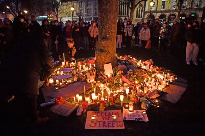 13 March 2021, United Kingdom, Bristol: People gather on College Green in Bristol after the "Reclaim These Streets" vigil this evening was officially cancelled. Serving police constable Wayne Couzens, 48, was charged on Friday evening with kidnapping an
