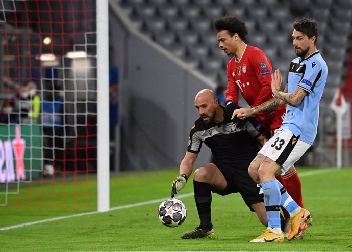 17 March 2021, Bavaria, Munich: Munich's Leroy Sane in action against Lazio goalkeeper Pepe Reina and Francesco Acerbi during the UEFAChampions League round of 16, second leg soccer match between Bayern Munich and SSLazio at Allianz Arena. Photo: Sven
