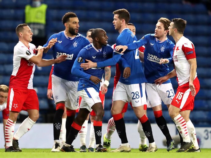 18 March 2021, United Kingdom, Glasgow: Tempers flare between players during the UEFA Europa League round of 16 second leg soccer match between Rangers FC and SK Slavia Prague at Ibrox Stadium. Photo: Andrew Milligan/PA Wire/dpa
