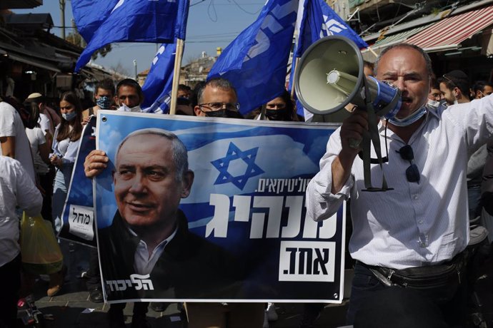 Seguidores del Likud del primer ministro de Israel, Benjamin Netanyahu, antes de las legislativas