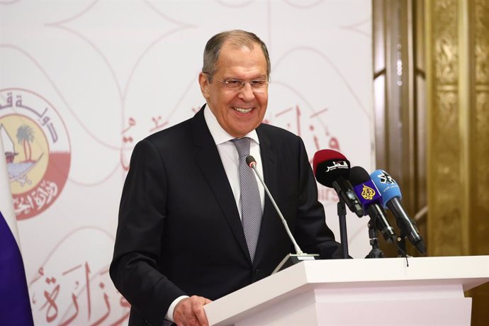 HANDOUT - 11 March 2021, Qatar, Doha: Russian Foreign Minister Sergey Lavrov takes part in a press conference with Turkish Foreign Minister Mevlut Cavusoglu (not pictured) and Qatari Foreign Minister Mohammed bin Abdulrahman bin Jassim Al Thani (not pic