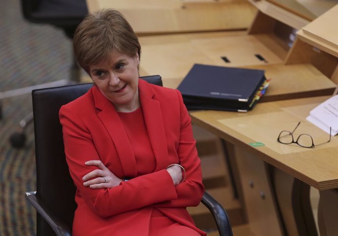 18 March 2021, United Kingdom, Edinburgh: First Minister of Scotland Nicola Sturgeon attends the First Minister's Questions at the Scottish Parliament. Photo: Fraser Bremner/Daily Mail via PA Wire/dpa