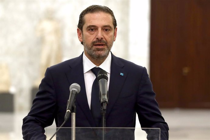 HANDOUT - 18 March 2021, Lebanon, Baabda: Lebanese Prime Minister-designate Saad Hariri speaks at a press conference following his meeting with President Michel Aoun at the presidential palace in Baabda. Aoun on Wednesday called on premier-designate Saa