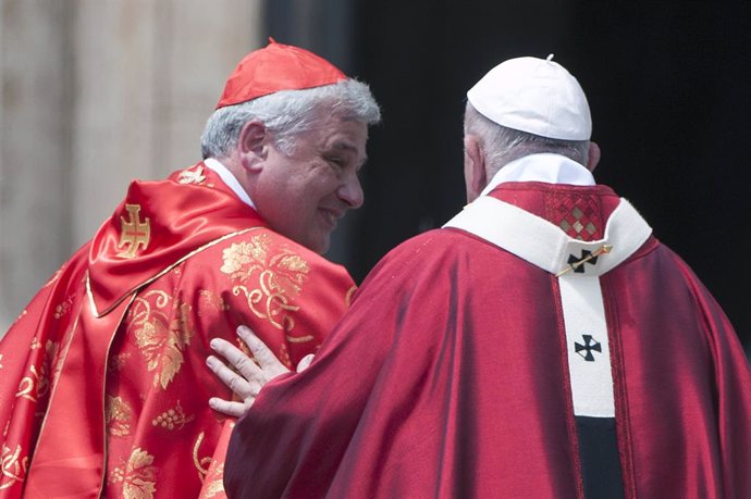 Archivo - June 9, 2019 - Vatican: Pope Francis speaks with Card. Konrad Krajewski during the Pentecost Mass in Saint Peter's square at the Vatican. (Alessia Giuliani/CPP/Contacto)