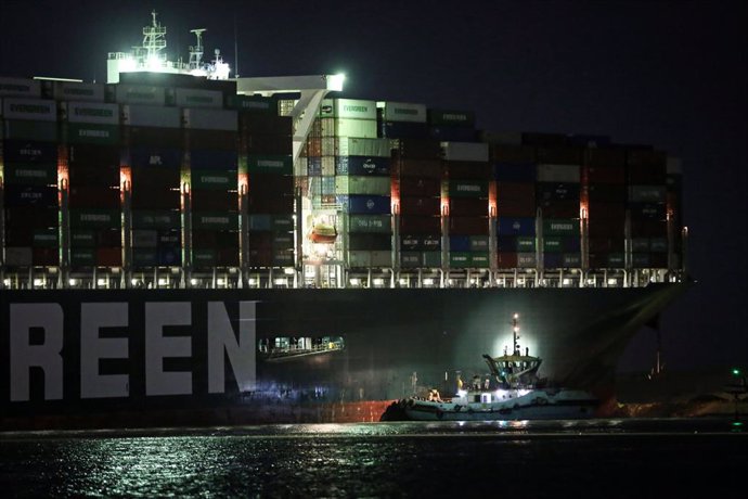 27 March 2021, Egypt, Suez: A general view of "Ever Given", a container ship operated by the Evergreen Marine Corporation which is currently stuck in the Suez canal, during a tugging attempt to re-float it. The state-run Suez Canal Authority (SCA) annou