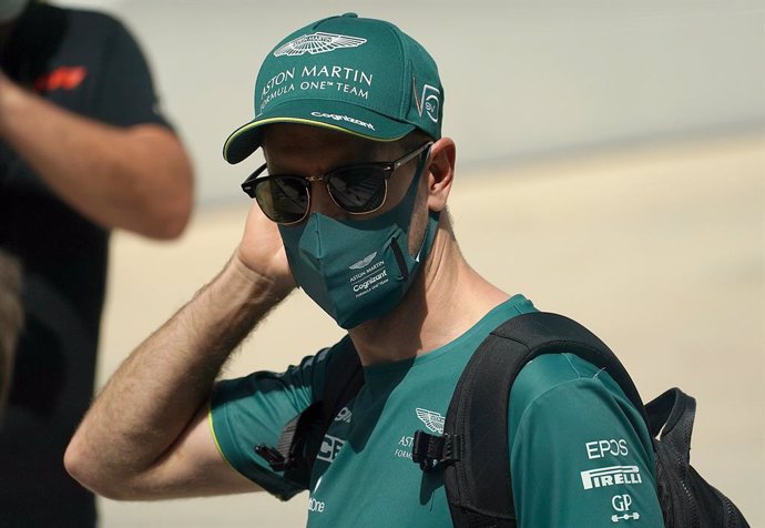 27 March 2021, Bahrain, Sakhir: German Formula One driver Sebastian Vettel of Team Aston Martin arrives at the Bahrain International Circuit ahead of the third practice for the Formula One 2021 Bahrain Grand Prix scheduled on 28 March. Photo: Hasan Brat