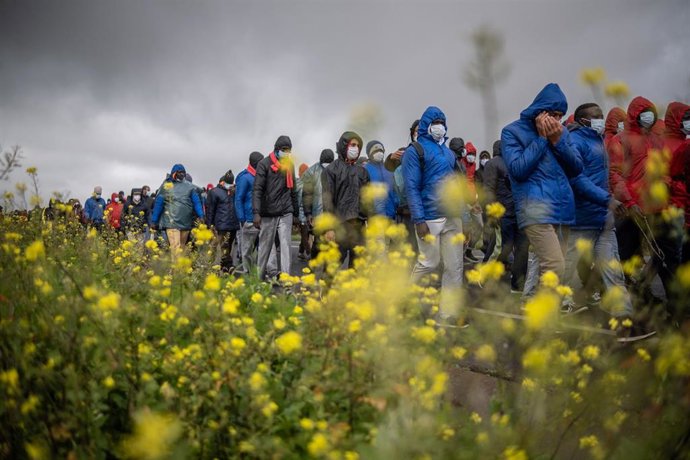06 March 2021, Spain, San Cristobal de La Laguna: Migrants and local supporters take part in a protest march from Las Raices camp to San Cristobal de la Laguna city centre to demand permission to travel to Spain's mainland. Photo: Andres Gutierrez/dpa