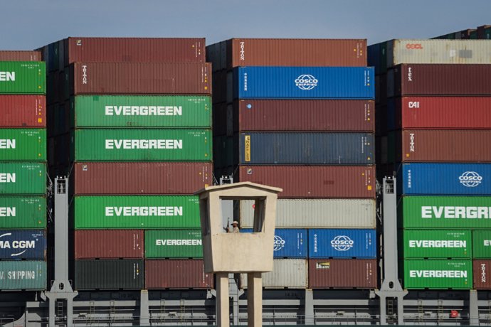 29 March 2021, Egypt, Suez: The "Ever Given" container ship operated by the Evergreen Marine Corporation, sails on the Suez Canal, after it was fully freed and floated. Egypt's Suez Canal Authority announced that the stranded massive container ship that