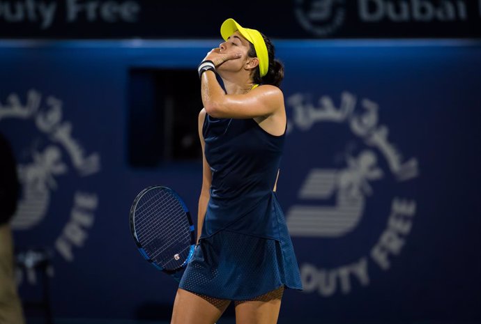 Garbine Muguruza of Spain reacts to winning the final of the 2021 Dubai Duty Free Tennis Championships WTA 1000 tournament