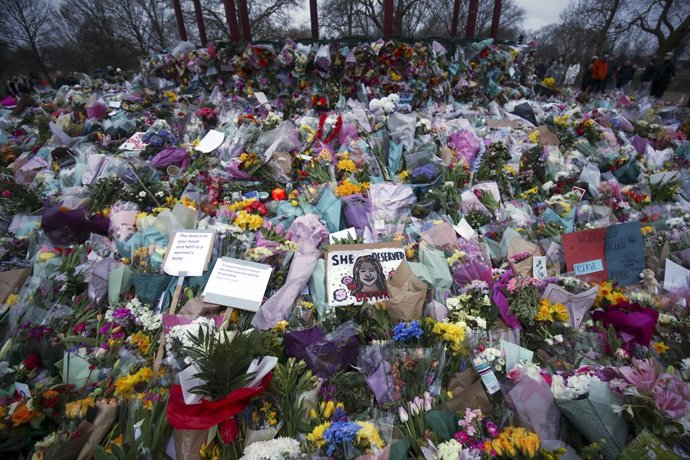 14 March 2021, United Kingdom, London: Floral tributes are left at the Bandstand on Clapham Common, a day after clashes between police and crowds who gathered at the site to remember Sarah Everard. The Metropolitan Police has faced intense criticism for