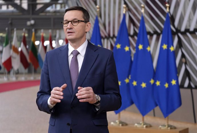 Archivo - FILED - 10 December 2020, Belgium, Brussels: Polish Prime Minister Mateusz Morawiecki speaks to media as he arrives for the first day of a two days face-to-face European Council summit. Morawiecki said in a press statement published today, Thu