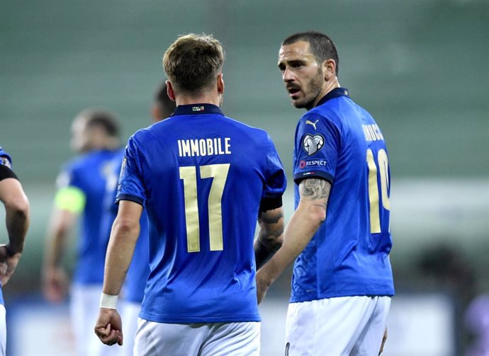  Italy's Ciro Immobile (L) celebrates scoring his side's second goal with teammate Leonardo Bonucci during the 2022 FIFA World Cup European Qualifiers group C soccer match between Italy and Northern Ireland at Stadio Ennio Tardini.
