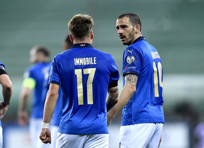 25 March 2021, Italy, Parma: Italy's Ciro Immobile (L) celebrates scoring his side's second goal with teammate Leonardo Bonucci during the 2022 FIFA World Cup European Qualifiers group C soccer match between Italy and Northern Ireland at Stadio Ennio Ta