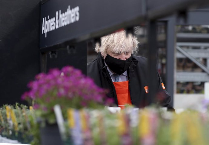 01 April 2021, United Kingdom, Teesside: British Prime Minister Boris Johnson visits the garden centre of the B&Q store in Middlesbrough. Around two million of the UK's lowest-paid workers will receive a pay rise from Thursday with increases in statutor