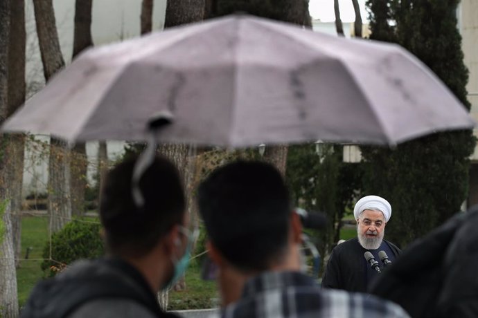 HANDOUT - 17 March 2021, Iran, Tehran: Iranian President Hassan Rouhani delivers a speech after the last cabinet meeting in the Persian calendar, at the yard of the presidential palace. Photo: -/Iranian Presidency/dpa - ATTENTION: editorial use only and