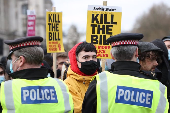 03 April 2021, United Kingdom, London: Police hold back demonstrators during the "Kill The Bill" protest at Parliament Square against the police, crime, sentencing and courts bill. Photo: Jonathan Brady/PA Wire/dpa