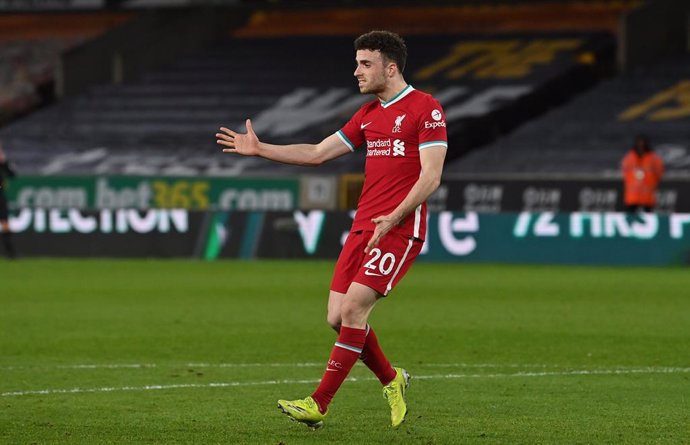 15 March 2021, United Kingdom, Wolverhampton: Liverpool's Diogo Jota celebrates scoring his side's first goal during the English Premier League soccer match between Wolverhampton Wanderers and Liverpool at Molineux Stadium. Photo: Paul Ellis/PA Wire/dpa