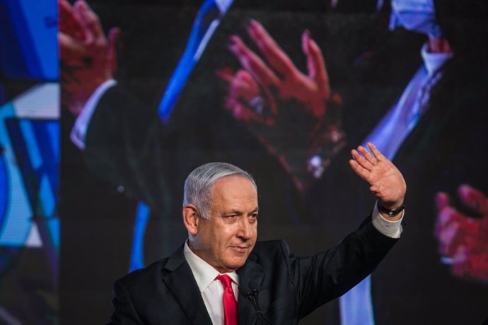 FILED - 24 March 2021, Israel, Jerusalem: Israeli Prime Minister Benjamin Netanyahu addresses supporters on stage at the party headquarters after polls closed in the Israeli Parliamentary election. President of Israel Reuven Rivlin on Tuesday nominated 