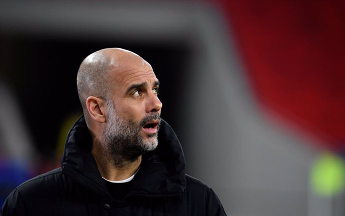 16 March 2021, Hungary, Budapest: Manchester City manager Pep Guardiola is pictured before the UEFA ChampionsLeague round of 16 second leg soccer match between Manchester City and Borussia Moenchengladbach at Puskas Arena. Photo: Marton Monus/dpa
