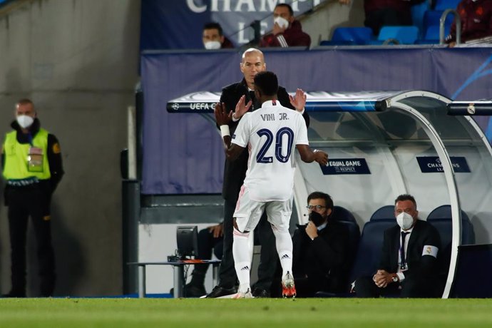 Vinicius Junior of Real Madrid celebrates a goal with Zinedine Zidane, head coach of Real Madrid, during the UEFA Champions League, Quarter finals round 1, football match played between Real Madrid and Liverpool FC at Alfredo Di Stefano stadium on April