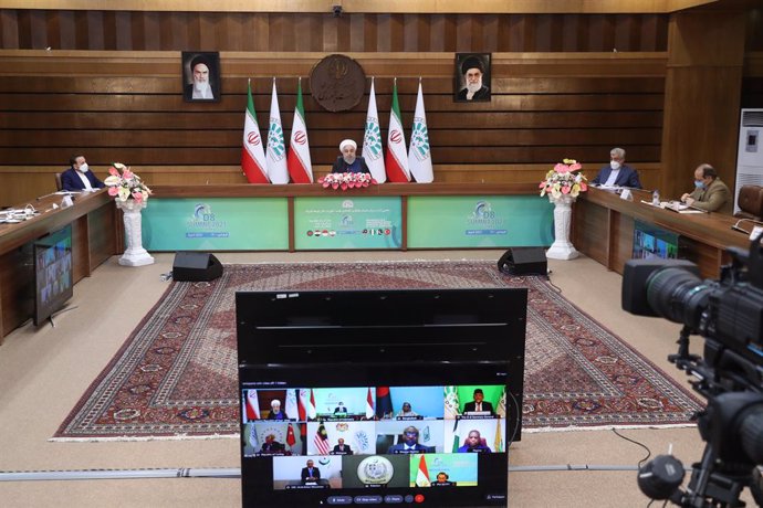 HANDOUT - 08 April 2021, Iran, Tehran: Iranian President Hassan Rouhani takes part in the 10th edition of the D-8 Summit via video conference. Photo: -/Iranian Presidency/dpa - ATTENTION: editorial use only and only if the credit mentioned above is refe