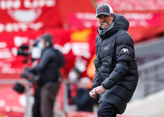 10 April 2021, United Kingdom, Liverpool: Liverpool's manager Jurgen Klopp cheers after the final whistle of the English Premier League soccer match between Liverpool and Aston Villa at Anfield. Photo: Darren Staples/CSM via ZUMA Wire/dpa