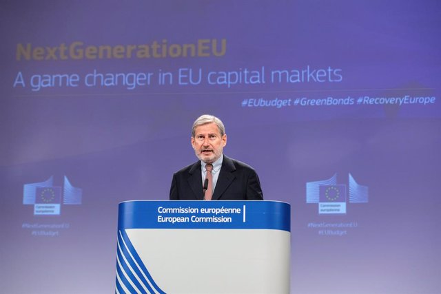 HANDOUT - 14 April 2021, Belgium, Brussels: Johannes Hahn, European Commissioner for Budget and Administration, speaks during a press conference on NextGenerationEU - Funding strategy to finance the Recovery Plan for Europe. Photo: Lukasz Kobus/European